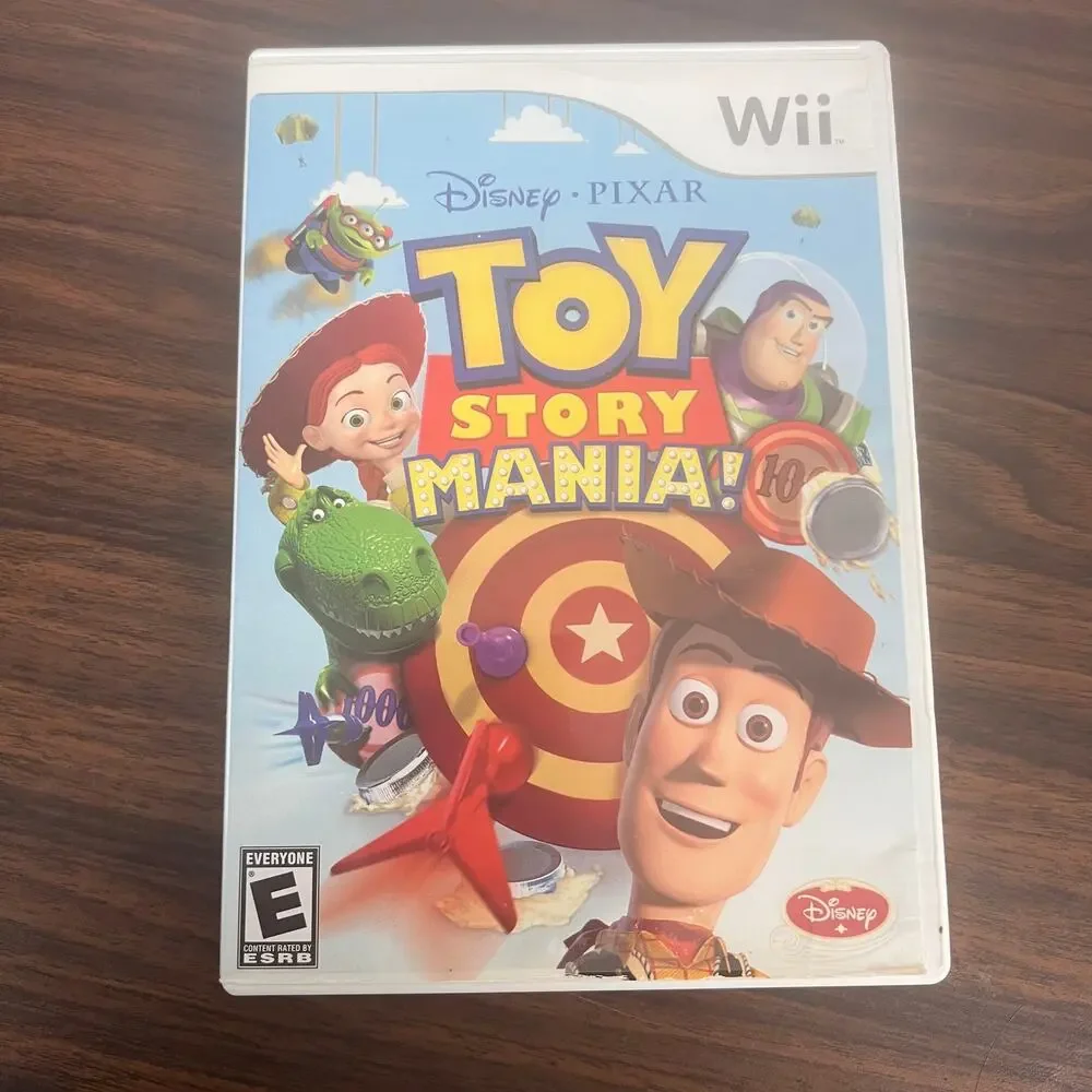 Wii Lot of 4 Video Games Monopoly Backyard Football Pictionary Toy Story CIB